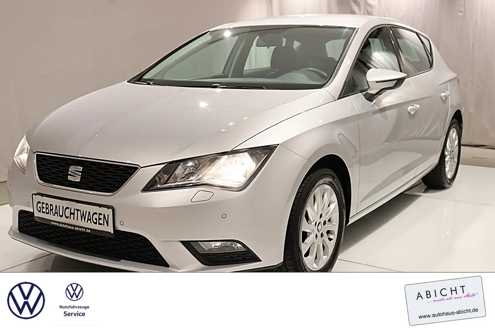 SEAT Leon 1.4 TSI Style 125 PS PDC NAVI SHZ BT ZV Klima Silber - 1