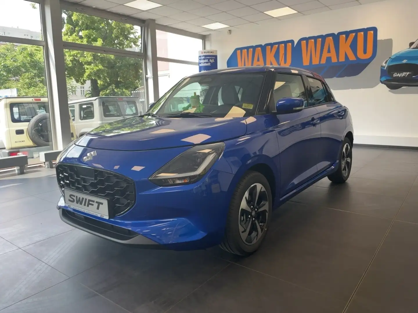 Suzuki Swift COMFORT+ HYBRID Blau - 1