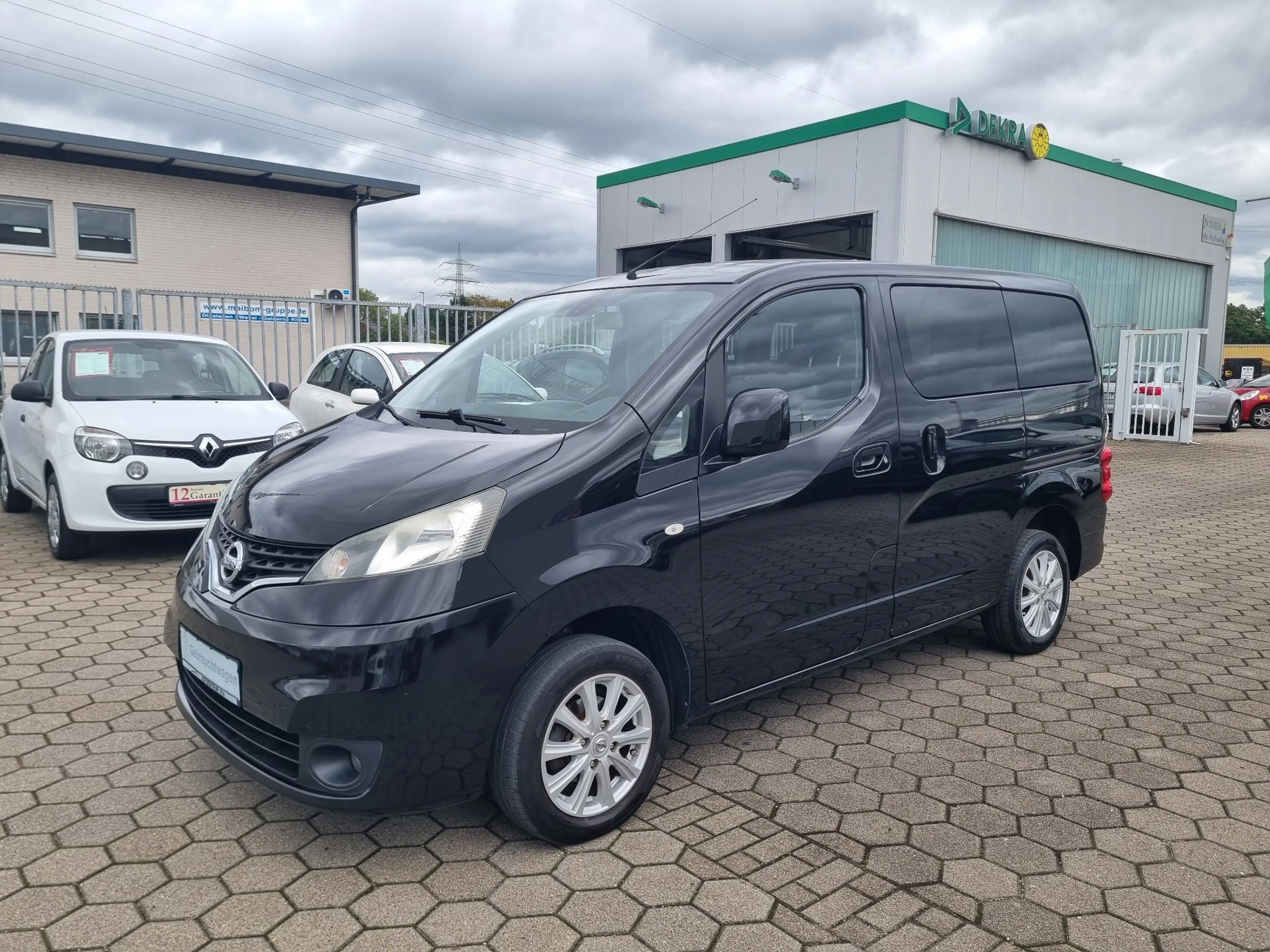 Nissan NV200 1.5 dCi Tekna Premium"7-Sitzer"Navi"8-fach bereift...