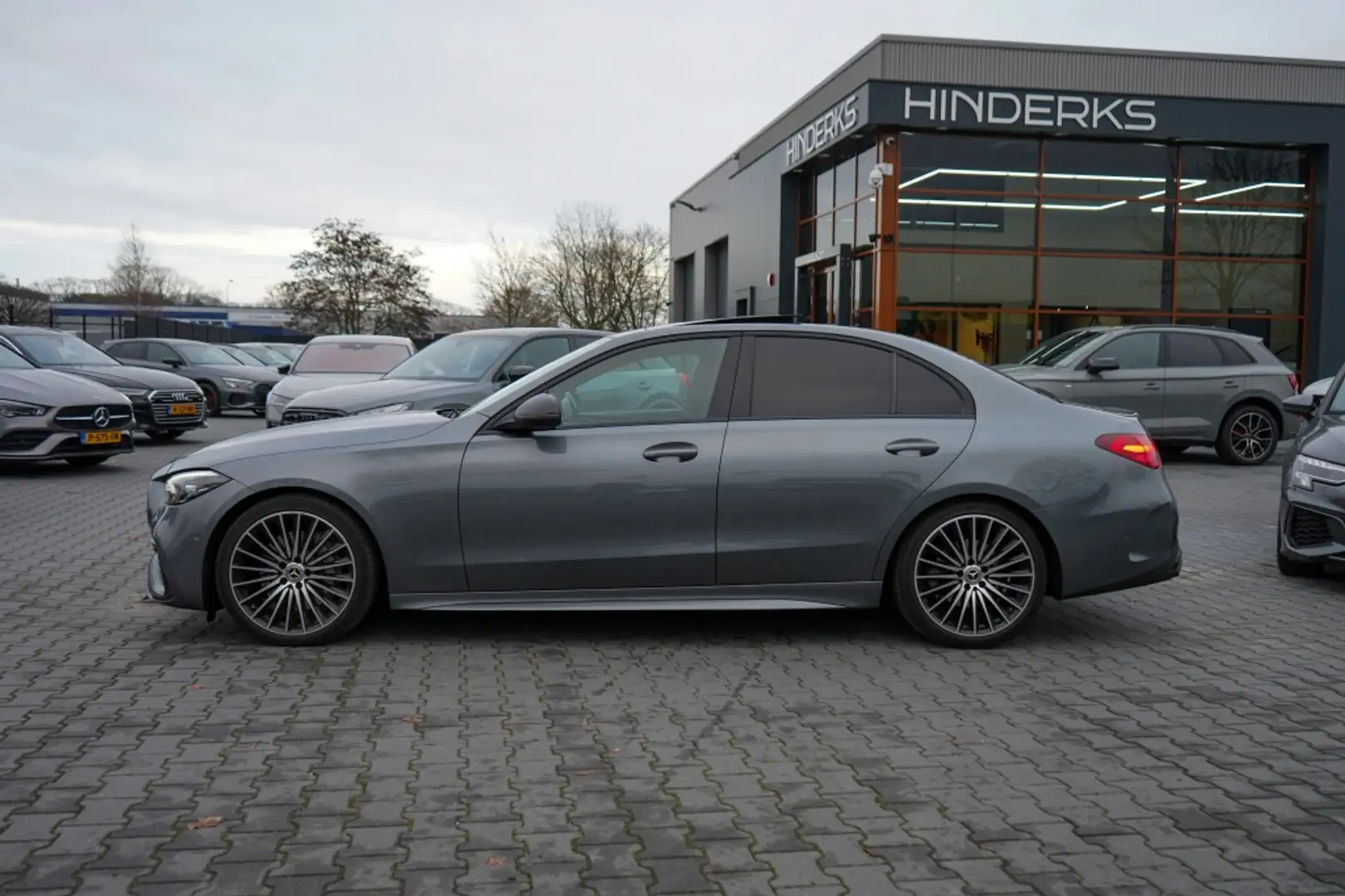 Mercedes-Benz C 180 AMG Line | Pano | Sfeer | Led | Cruise | Trekhaak Grijs - 2