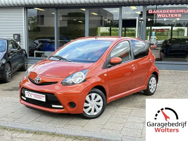 Toyota Aygo 1.0 VVT-i Comfort Orange AIRCO 5DRS TOERENTELLER