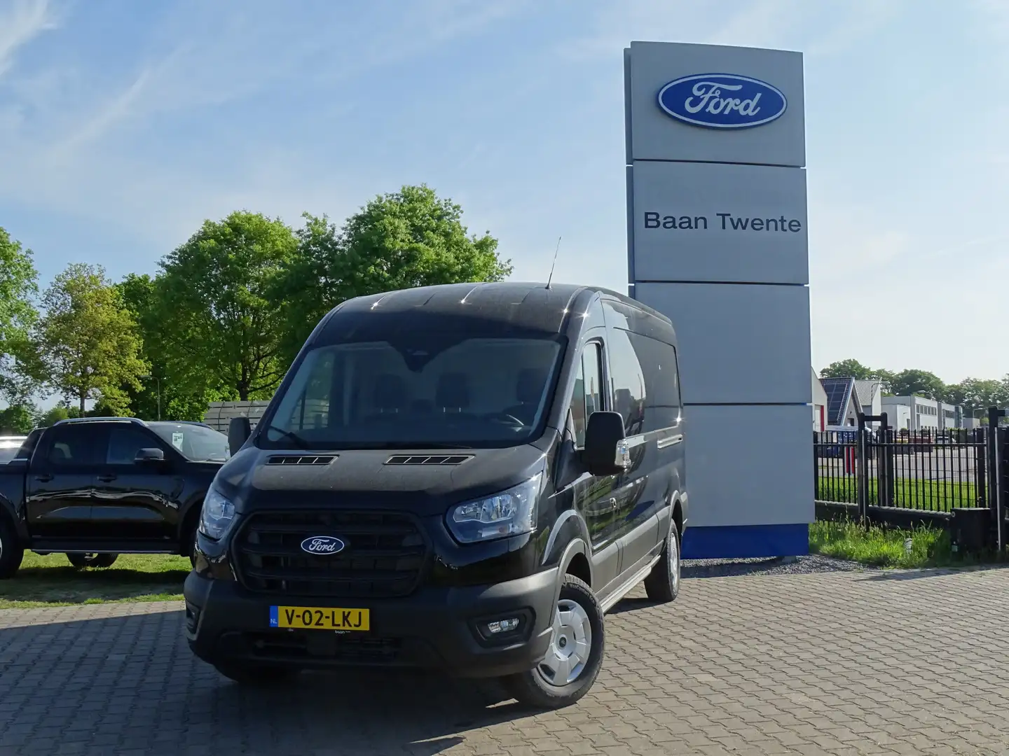 Ford Transit 350 2.0 TDCI L3H2 Trend 165 PK | 2x schuifdeur | T Zwart - 2
