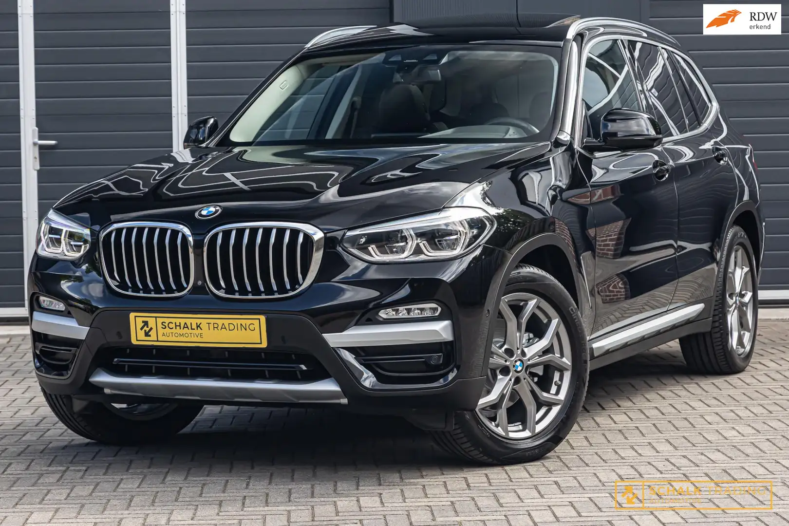BMW X3 XDrive20i High Executive|Pano|H&K|360 camera|Sport Zwart - 1