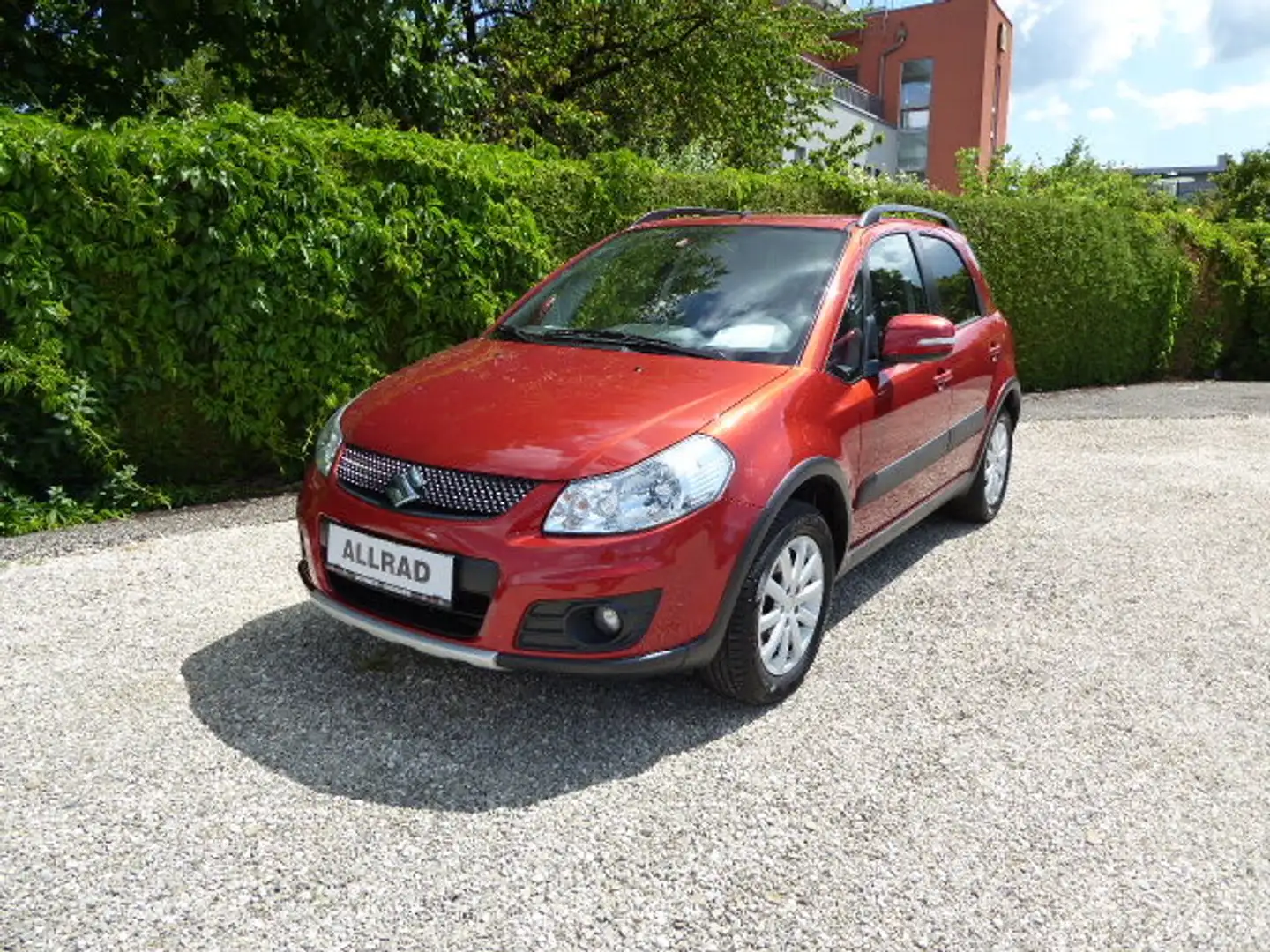 Suzuki SX4 1,6 GLX 4WD Navigator Orange - 1