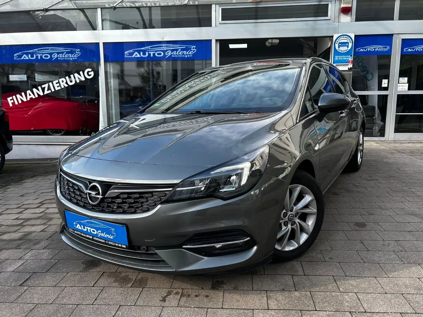 Opel Astra K Lim. 5-trg. Elegance /Kam/Navi/Lenkhz/LM Grigio - 1