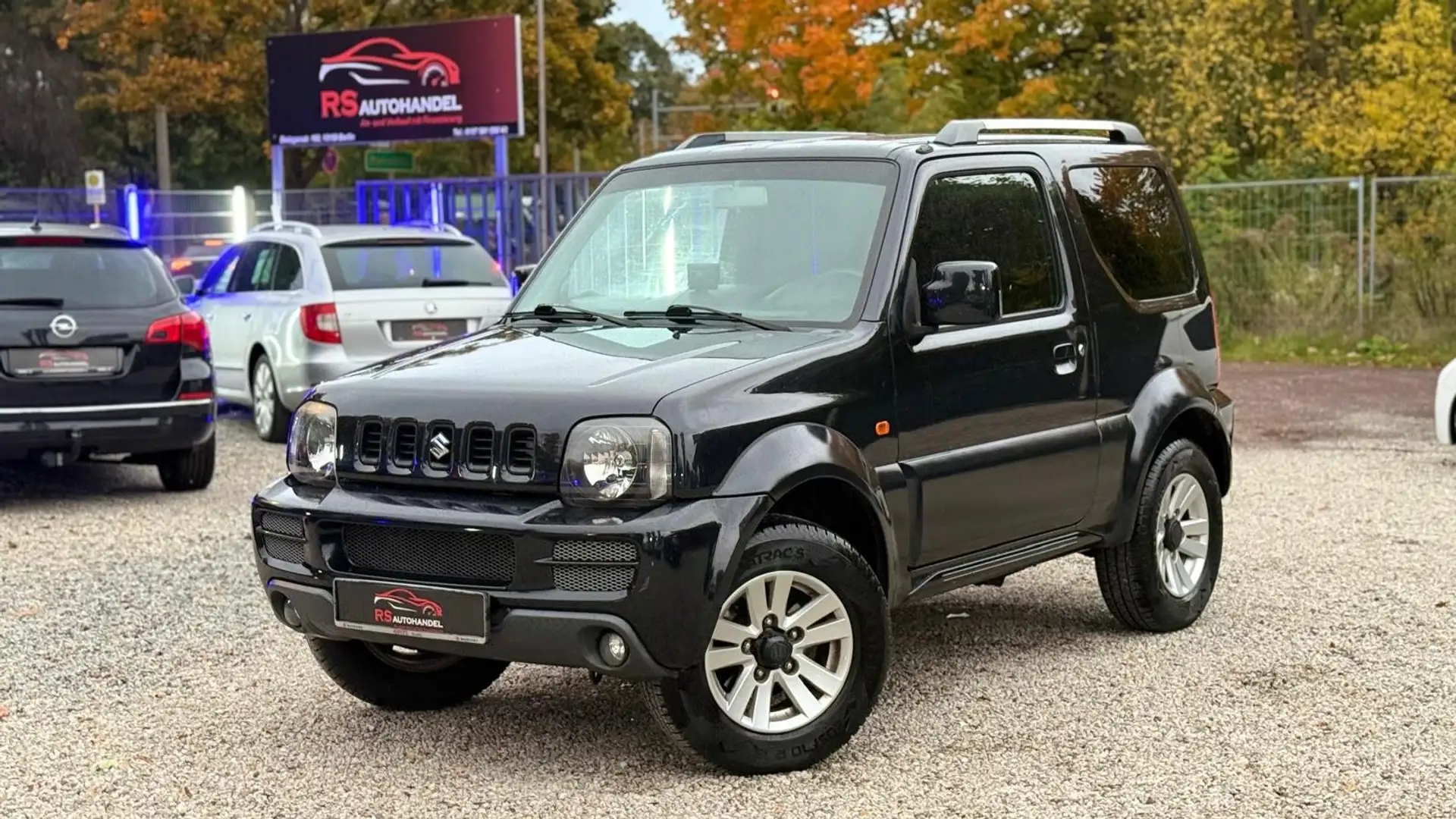 Suzuki Jimny Jimny 1.3*Kamera*AHK*TÜV*Klima*Leder Schwarz - 1