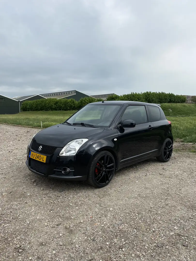 Suzuki Swift 1.6 Sport Zwart - 1