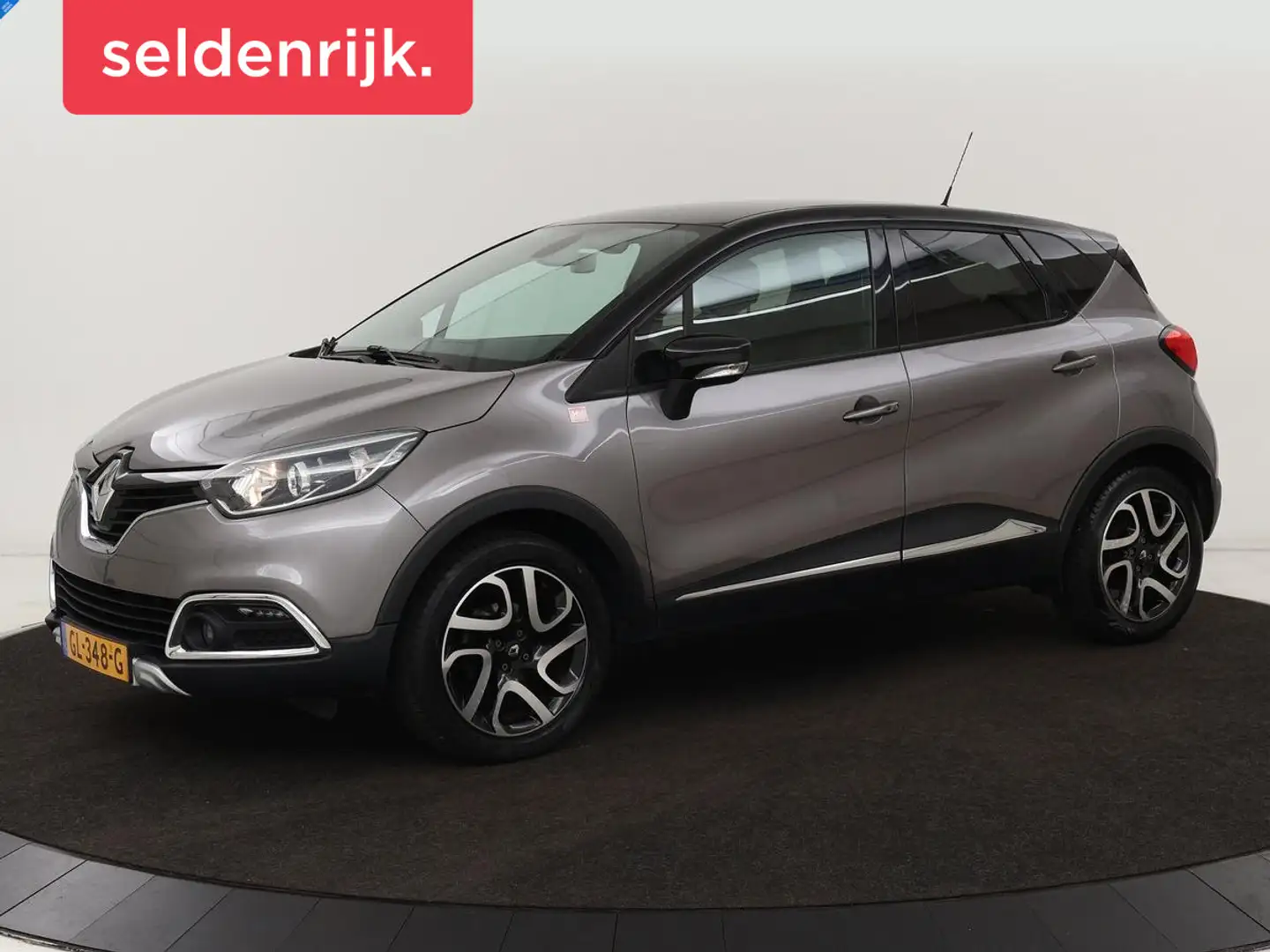Renault Captur 0.9 TCe Helly Hansen | 1e eigenaar | Stoelverwarmi Gris - 1
