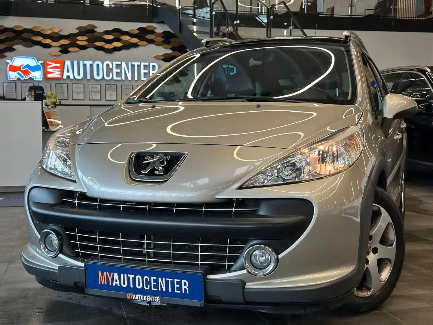 Peugeot 207 SW Escapade*2. Hand*Klima*Radio*Panorama*PDC Grau - 1