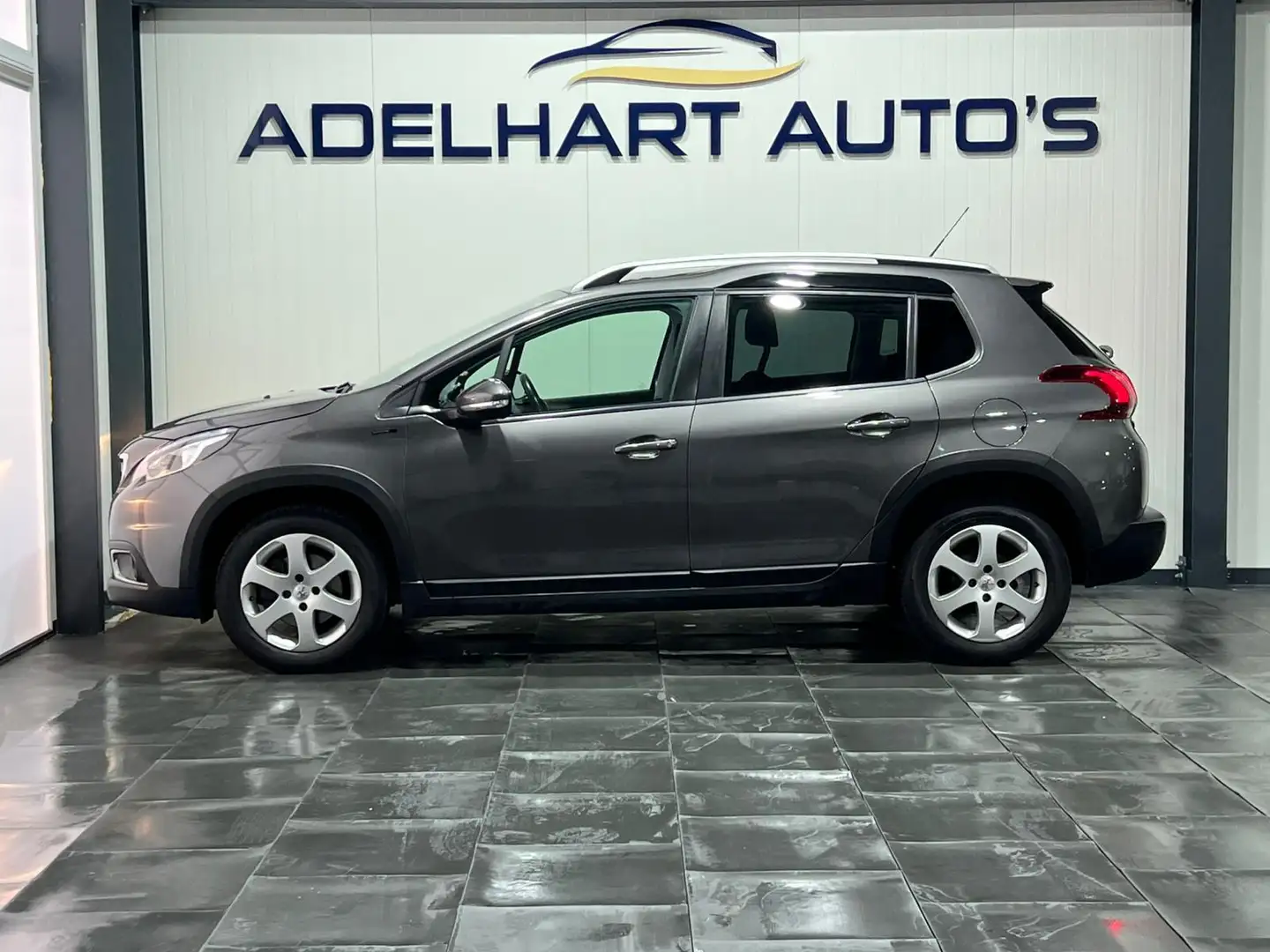 Peugeot 2008 1.2 PureTech Signature / Navigatie full map / Crui Grijs - 2