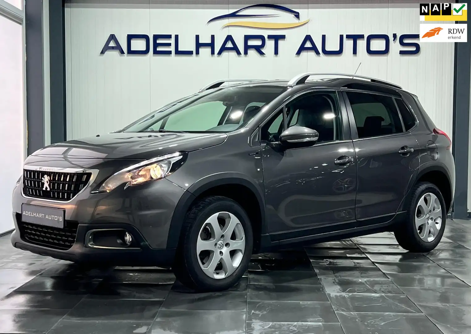 Peugeot 2008 1.2 PureTech Signature / Navigatie full map / Crui Grijs - 1