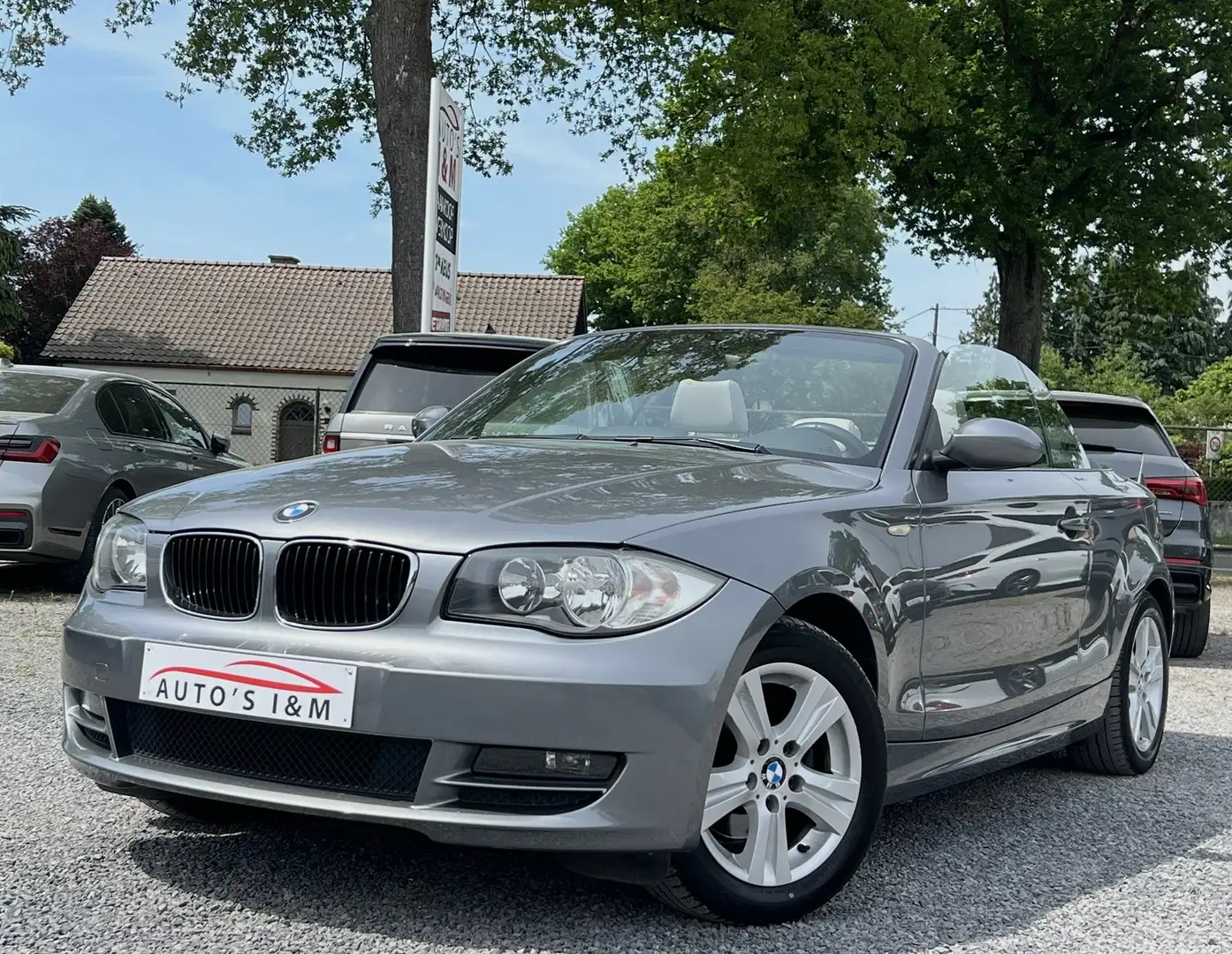 BMW 118 118iA Benzine Automaat 88Dkm Leder Navi Garantie! Grijs - 1