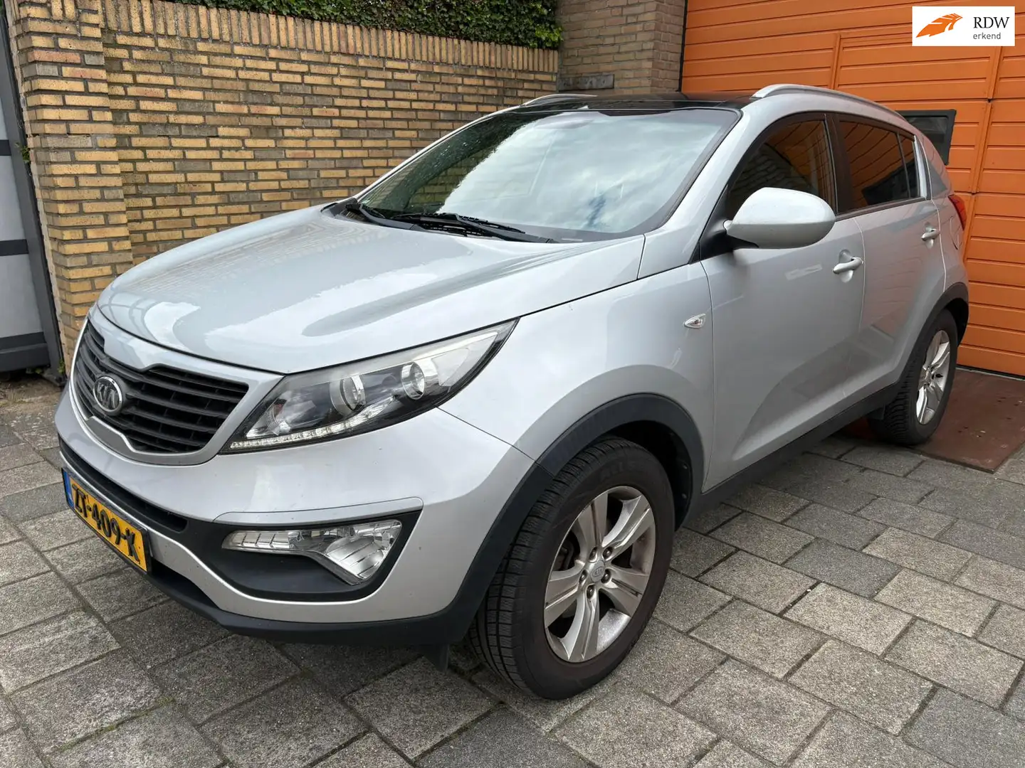 Kia Sportage 1.6 GDI X-tra / Panoramadak! Gris - 1