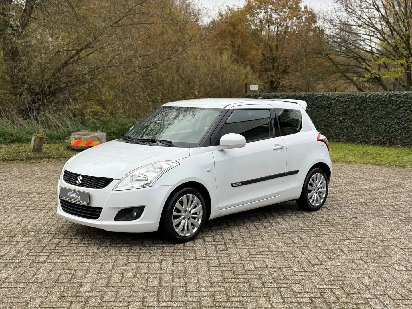 Suzuki Swift 1.2 Exclusive EASSS CRUISE I SPORTIEF I PARLEMOER Blanco - 1