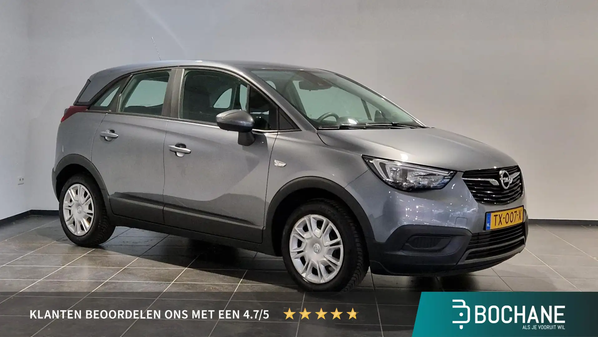 Opel Crossland X 1.2 Selection Grijs - 1