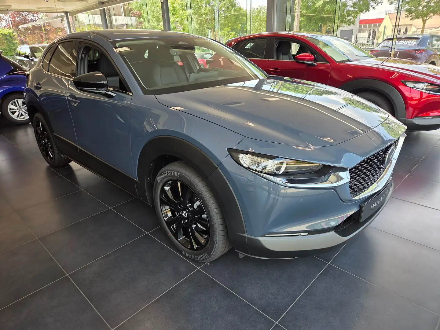 Mazda CX-30 2.0i SKYACTIV-X MHE Homura STOCKPROMO Grijs - 1