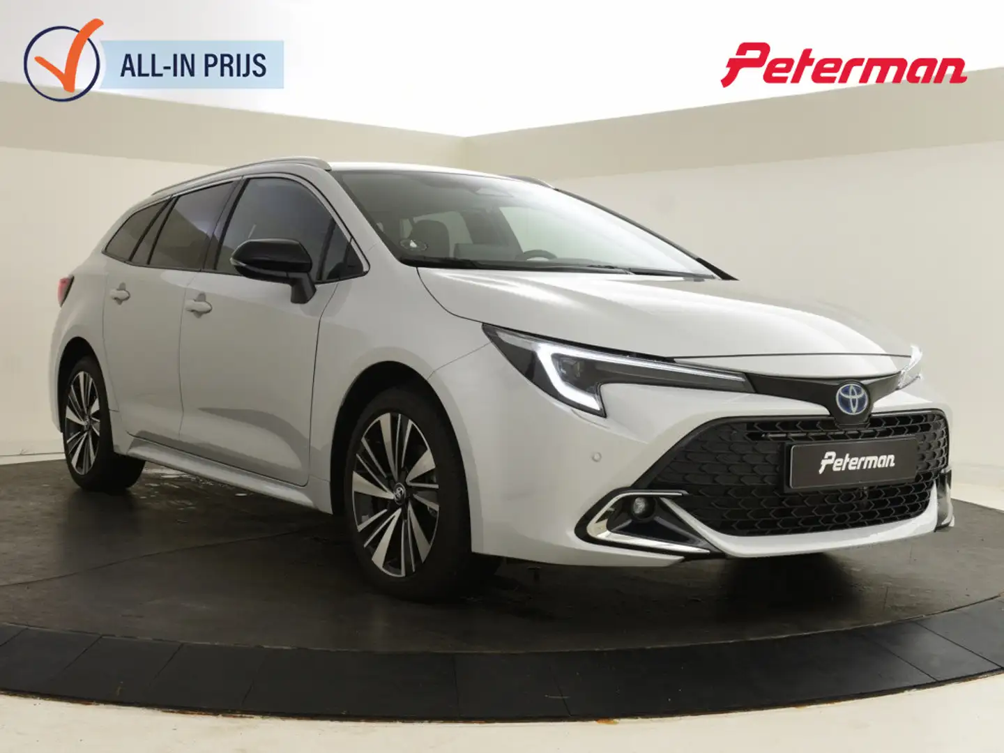 Toyota Corolla Touring Sports Hybrid 140 Style | Stuur en Stoelve Gris - 1