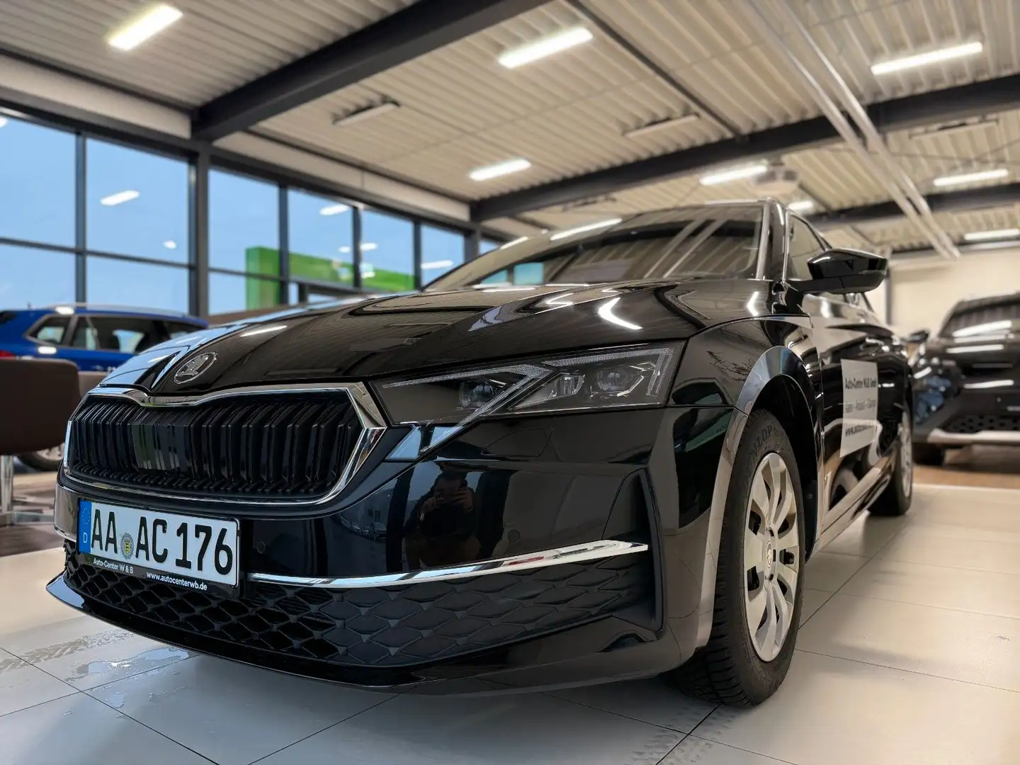 Skoda Octavia Combi 1.5 TSI mHEV DSG 110kW Exclusive Schwarz - 1