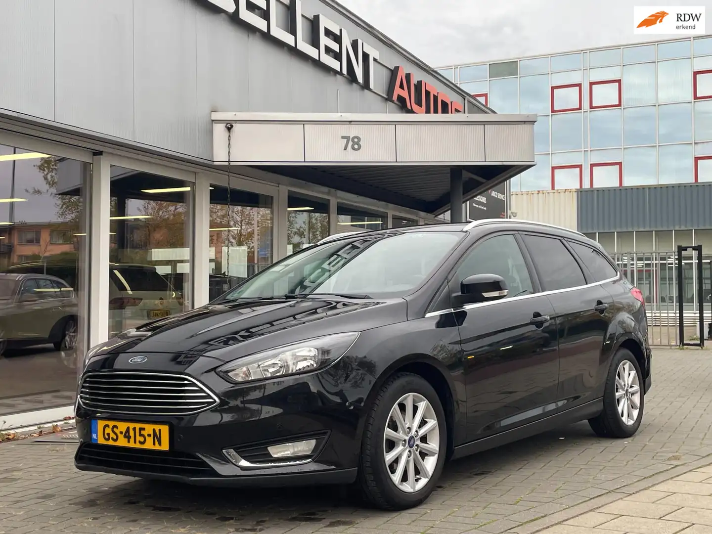 Ford Focus Wagon 1.0 First Edition - Navigatie Zwart - 1