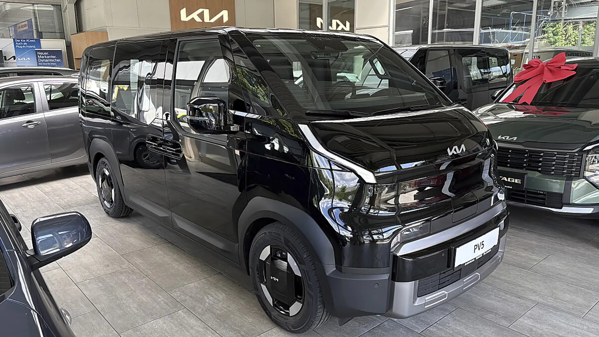 Kia Sonstige PV5 71,2kWh Earth +P1 +P2 +stark verdunkelte Sc... Schwarz - 2