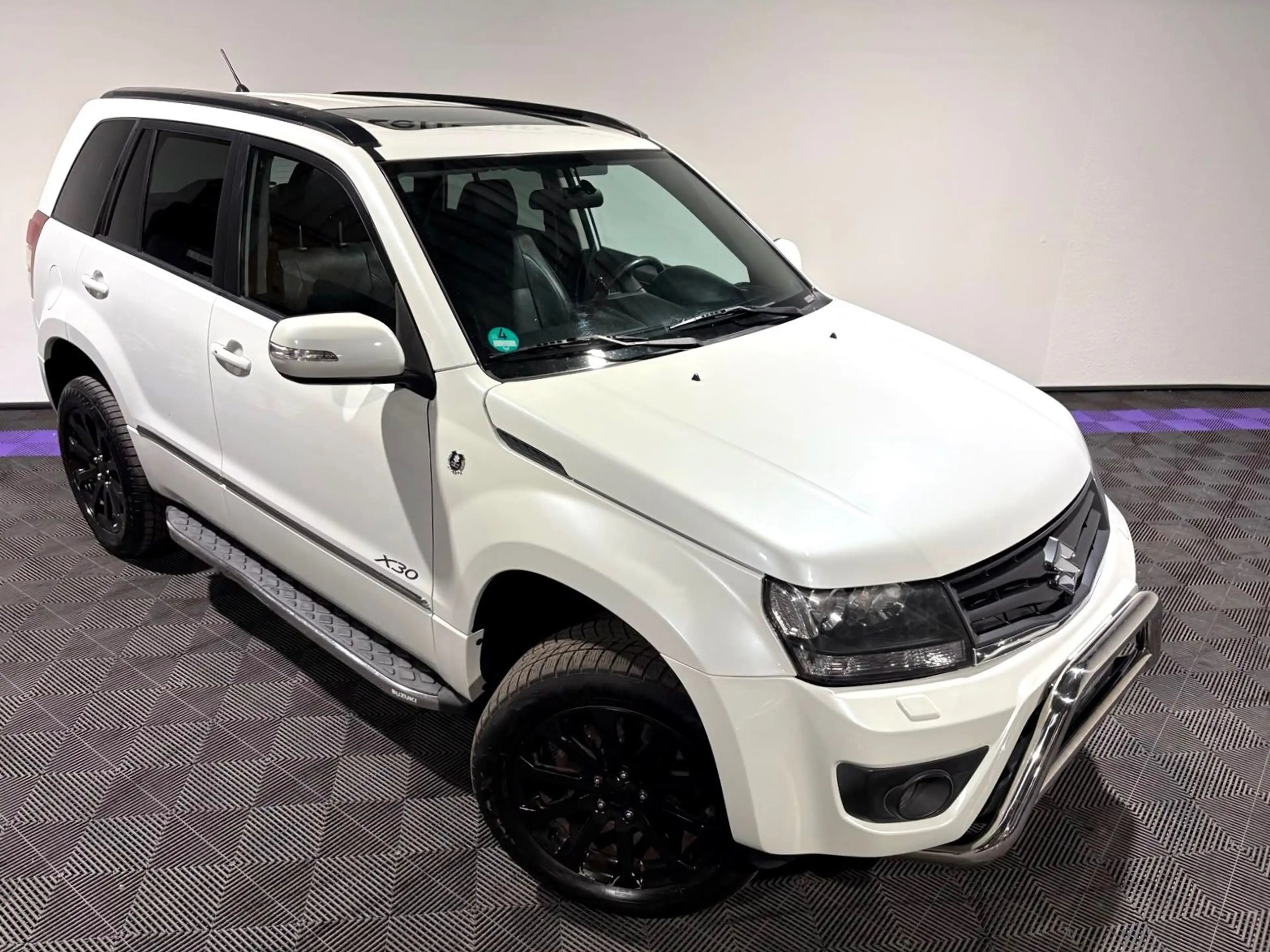 Suzuki Grand Vitara 1.9 DDIS X 30 Navi Leder Schiebedac — photo 11