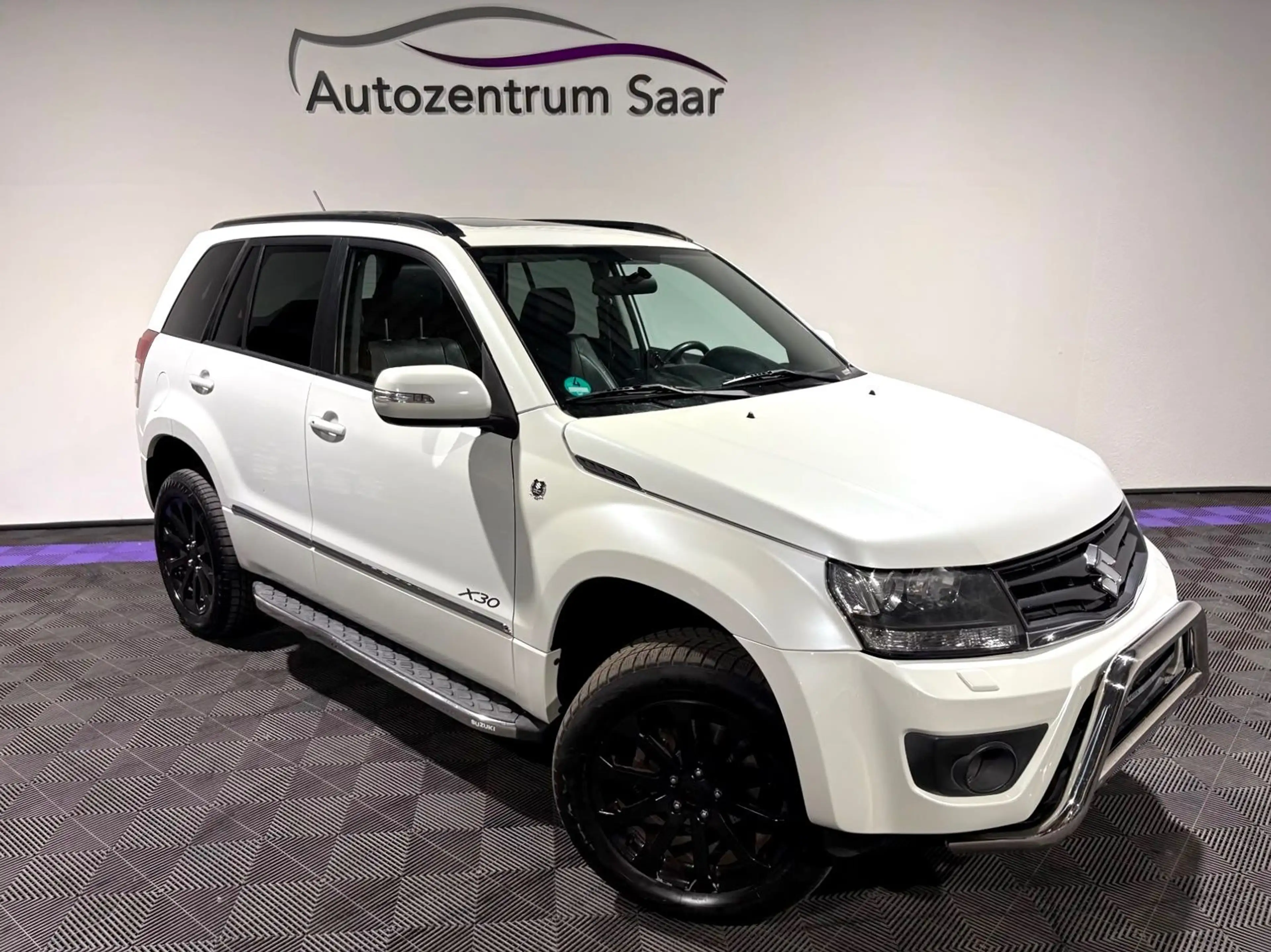 Suzuki Grand Vitara 1.9 DDIS X 30 Navi Leder Schiebedac — photo 10