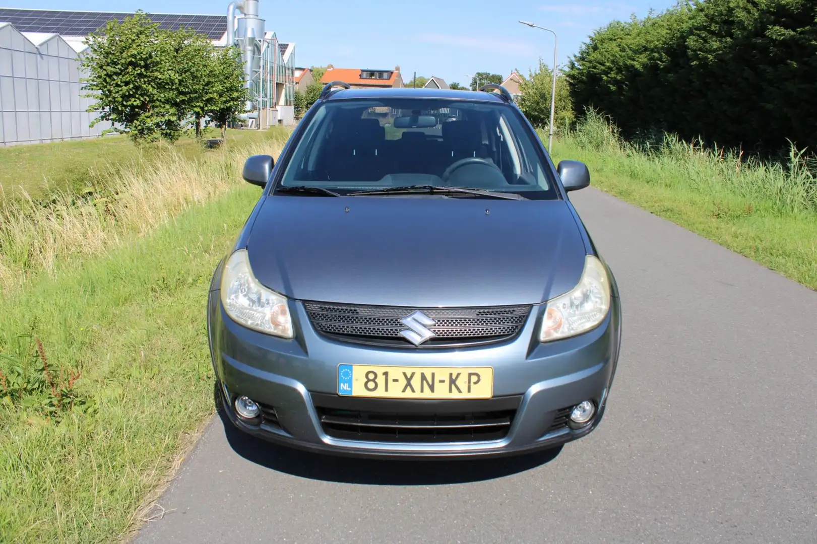 Suzuki SX4 1.6 Shogun met Airco Grijs - 2