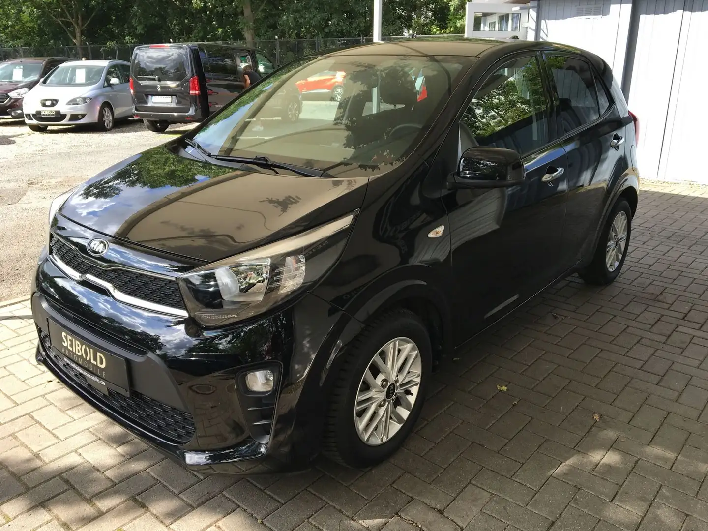 Kia Picanto 1.0Dream Team/Autom/25Tkm/Navi/Sitzh/PDC Negro - 1
