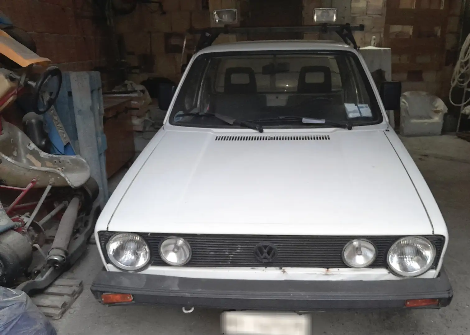 Volkswagen Caddy Pick-up (1ª serie - anno 1989) Белый - 1