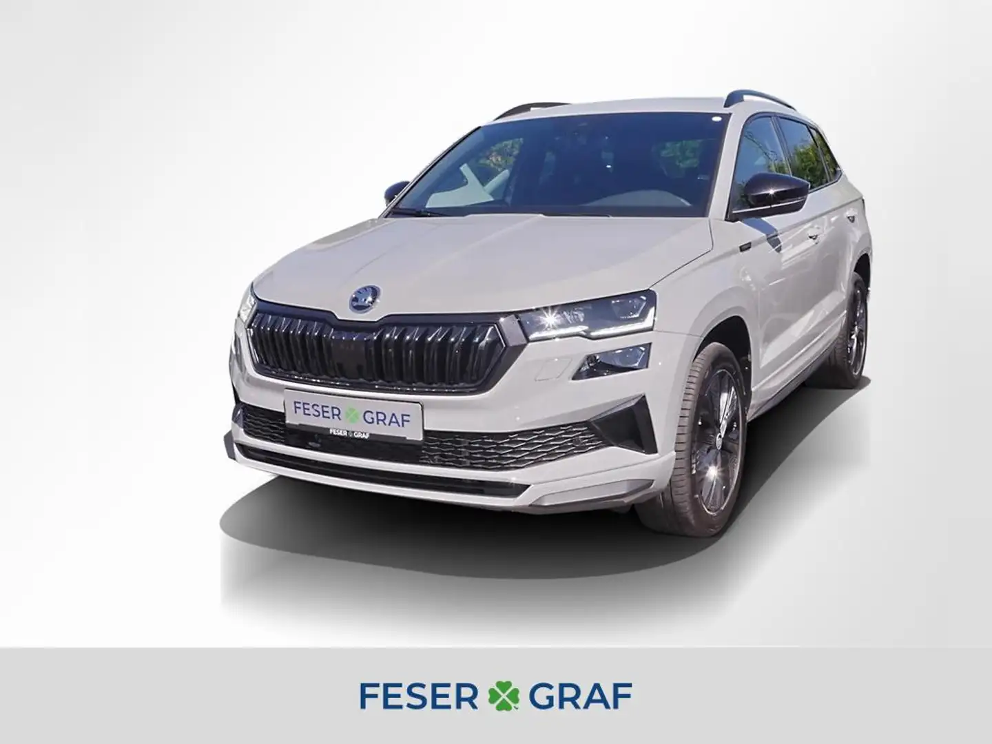 Skoda Karoq 2.0 TDI Sportline DSG AHK Kessy Navi Rüka Grijs - 1