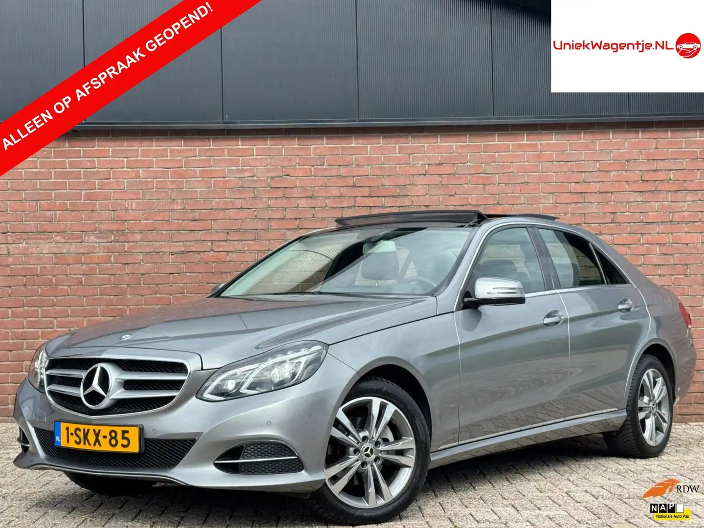 Mercedes-Benz E 200 | NL-AUTO! | DEALER OH! | LEDER! Grijs - 1