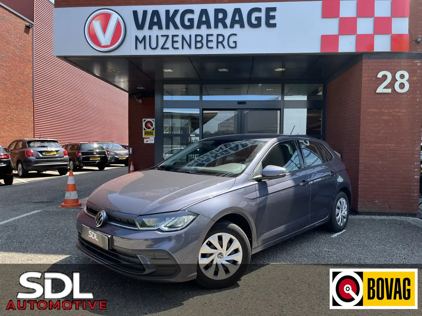 Volkswagen Polo 1.0 TSI Comfortline // CRUISE .// AIRCO // LED // Grijs - 1