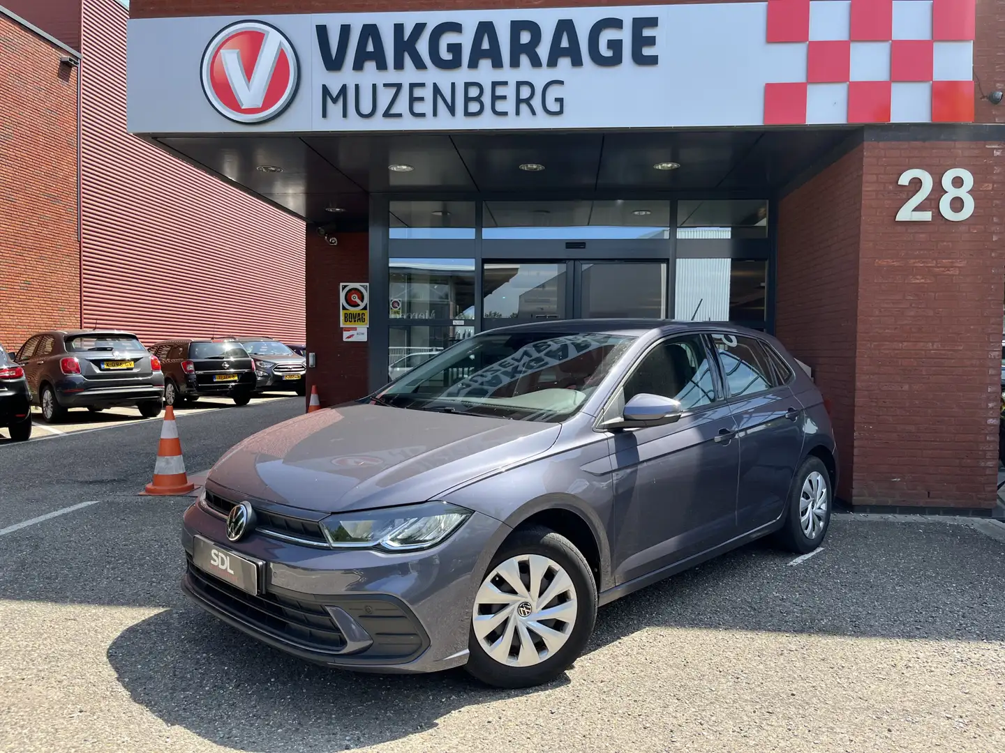Volkswagen Polo 1.0 TSI Comfortline // CRUISE .// AIRCO // LED // Gris - 1
