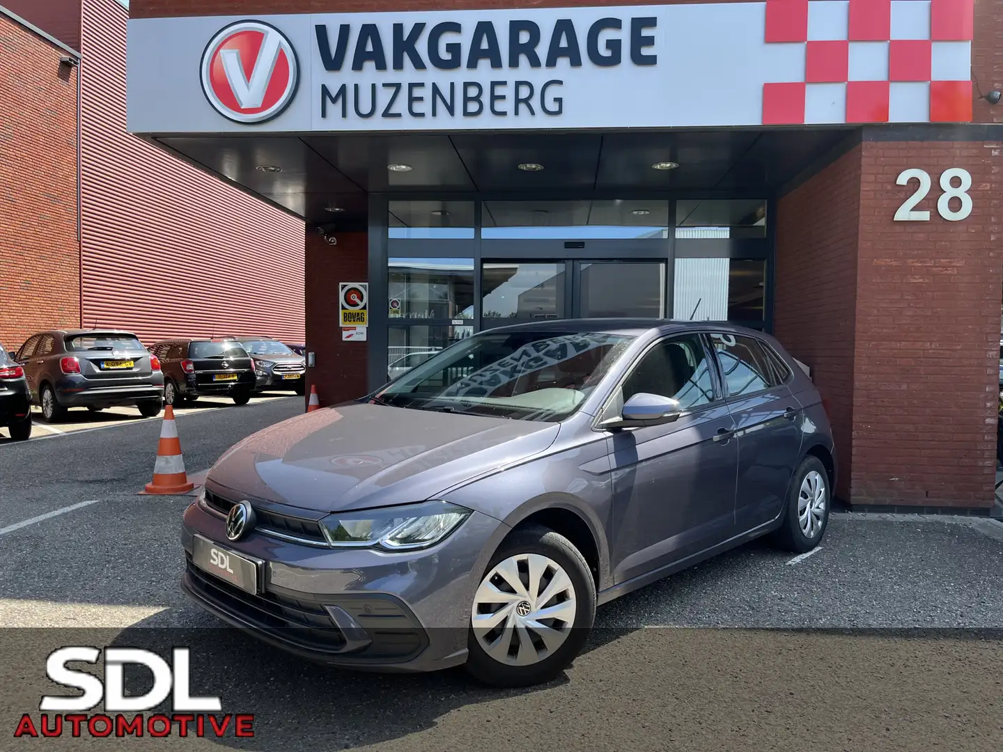 Volkswagen Polo 1.0 TSI Comfortline // CRUISE .// AIRCO // LED // Gris - 1