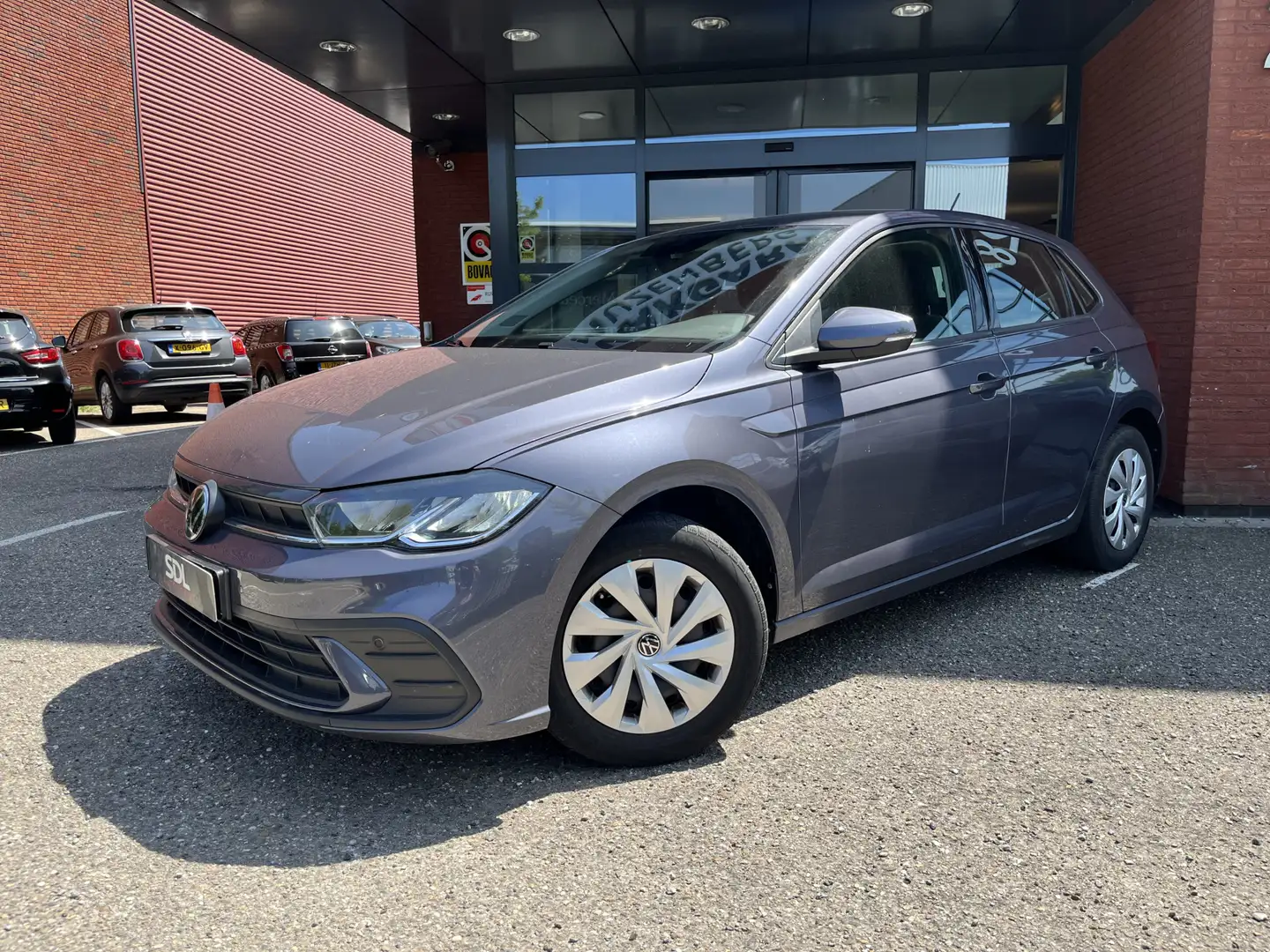 Volkswagen Polo 1.0 TSI Comfortline // CRUISE .// AIRCO // LED // Grijs - 2