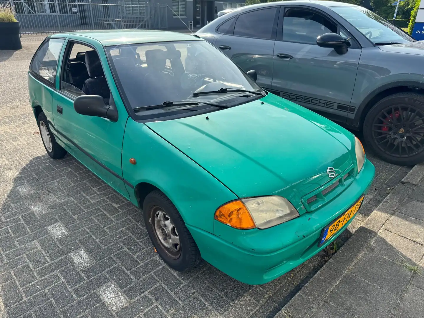 Suzuki Swift 1.0 GLS AUTOMAAT// INRUILER Verde - 1