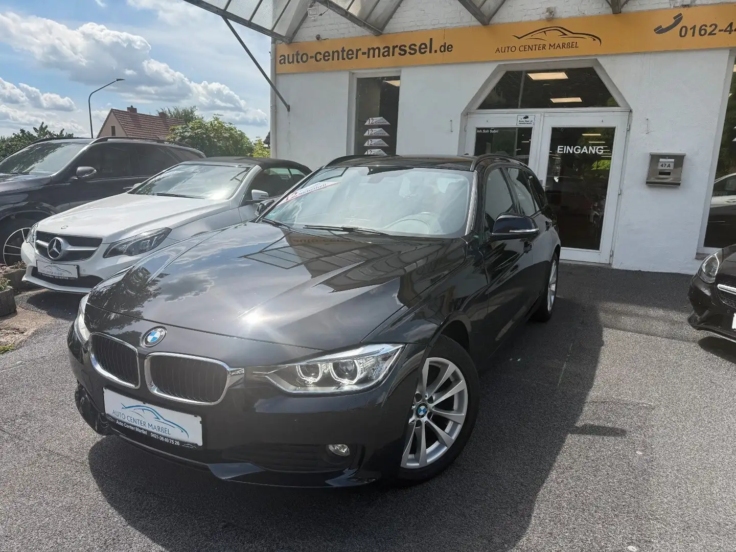 BMW 318 d Touring NAVI/AHK/PDC/SHZ/BIXENON Fekete - 1