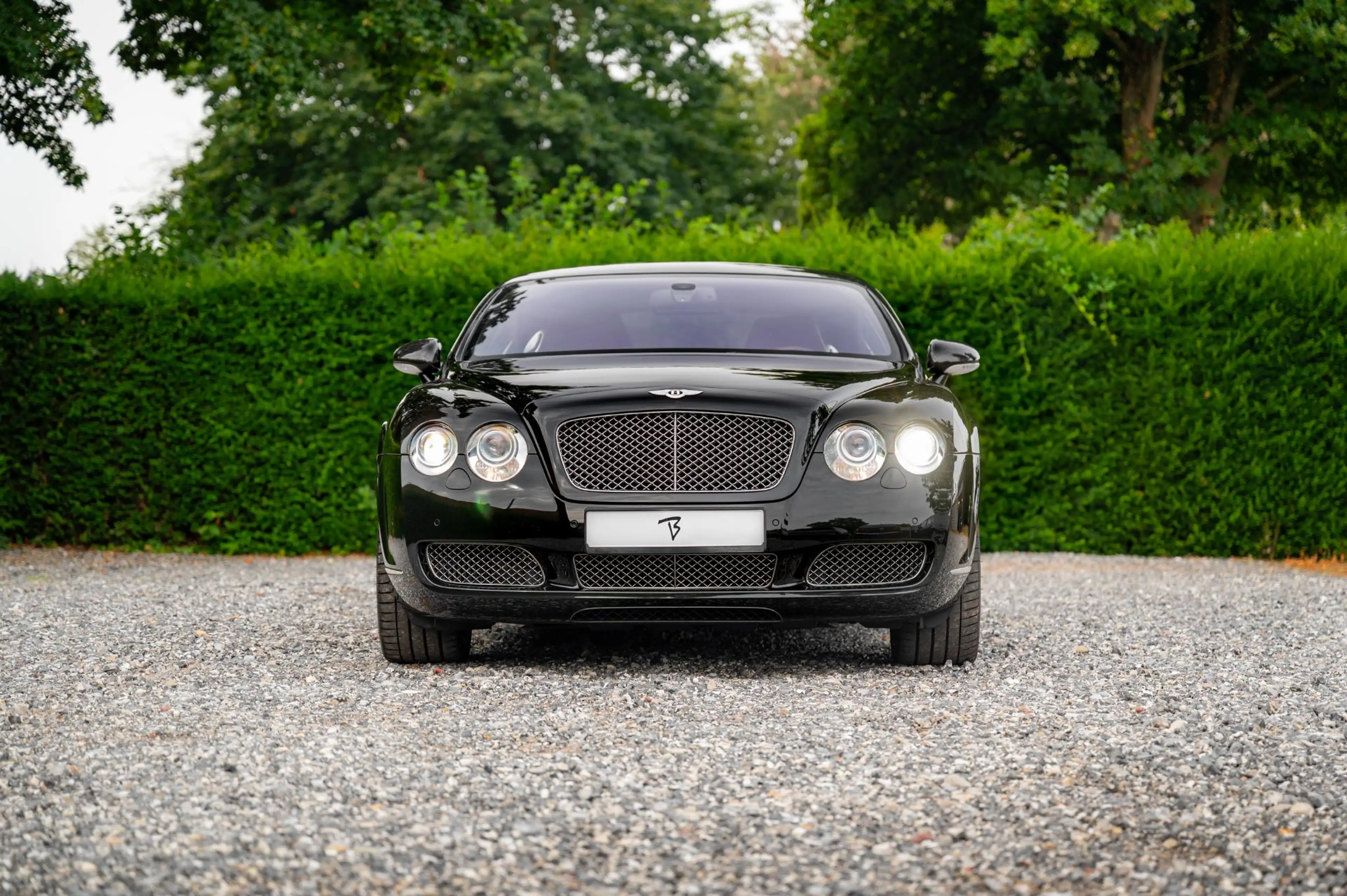 Bentley Continental GT 6.0 W12 560pk | Zwart/Cognac | — photo 25