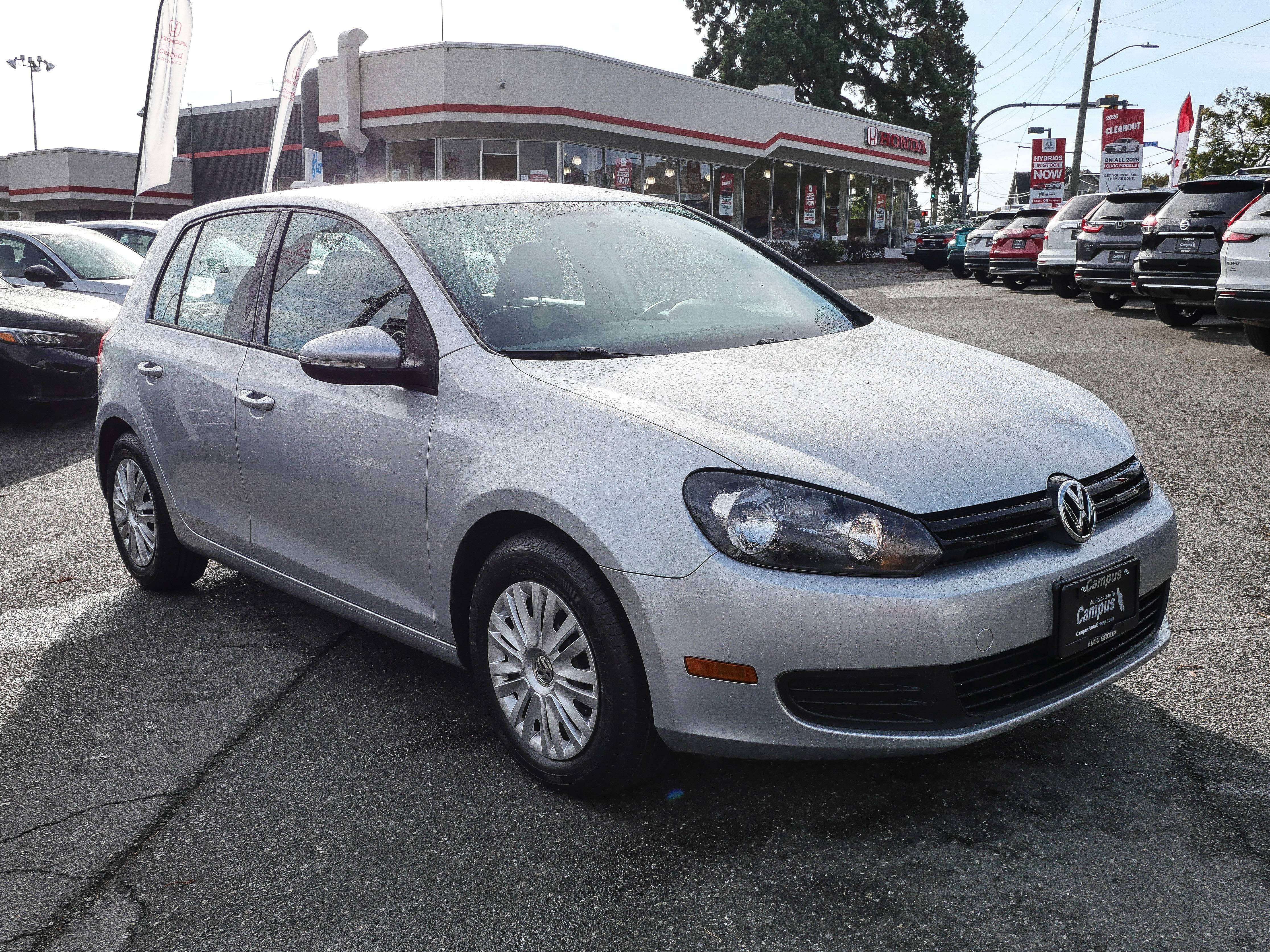 Silver 2011 Volkswagen Golf Hatchback  6-Speed Automatic