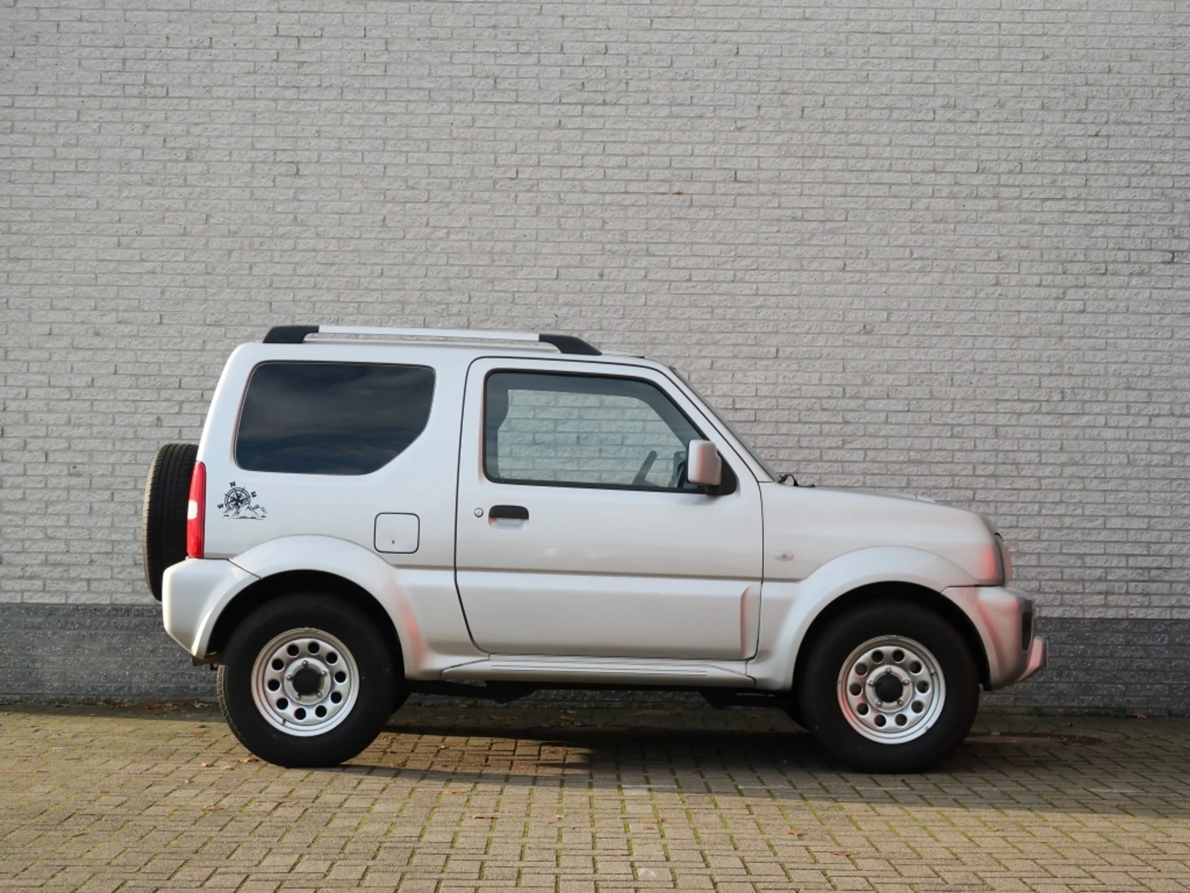 Suzuki Jimny 1.3 Exclusive / Automaat / 4x4 — photo 6