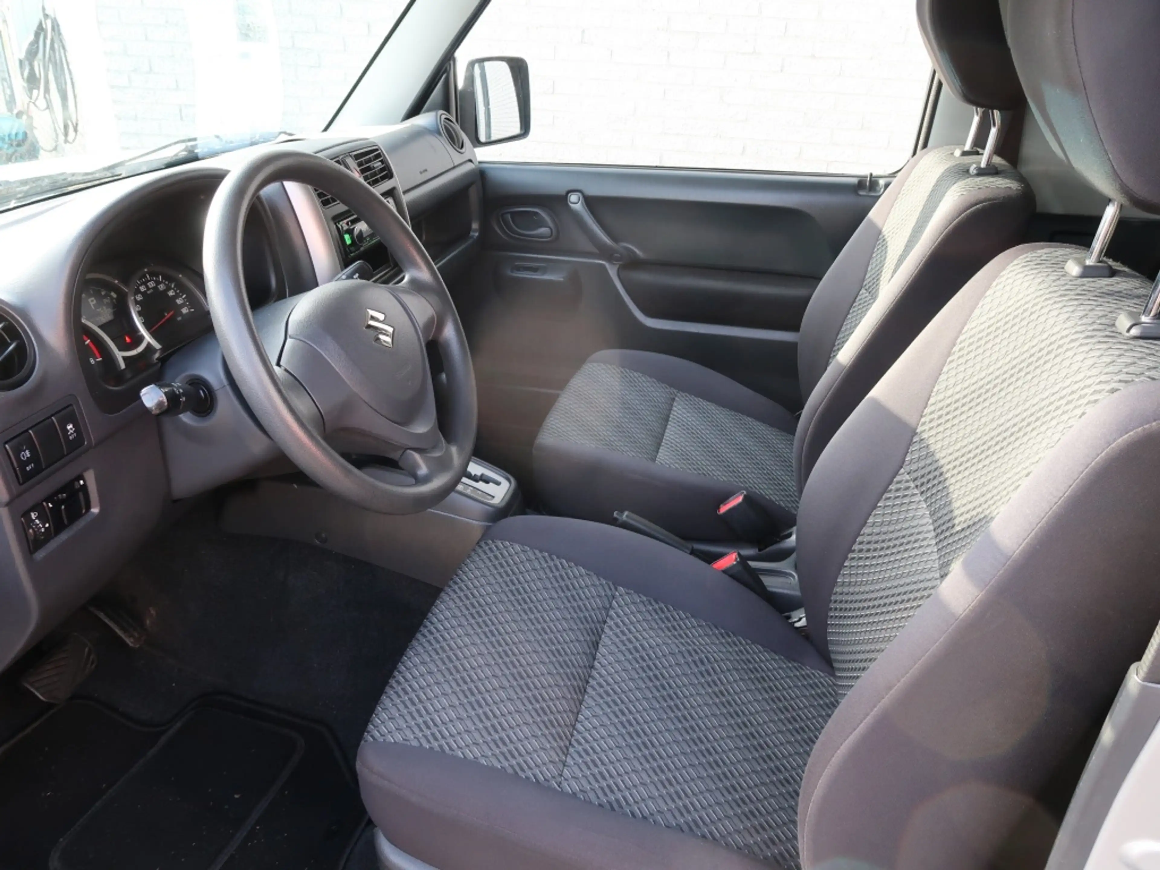 Suzuki Jimny 1.3 Exclusive / Automaat / 4x4 — photo 9