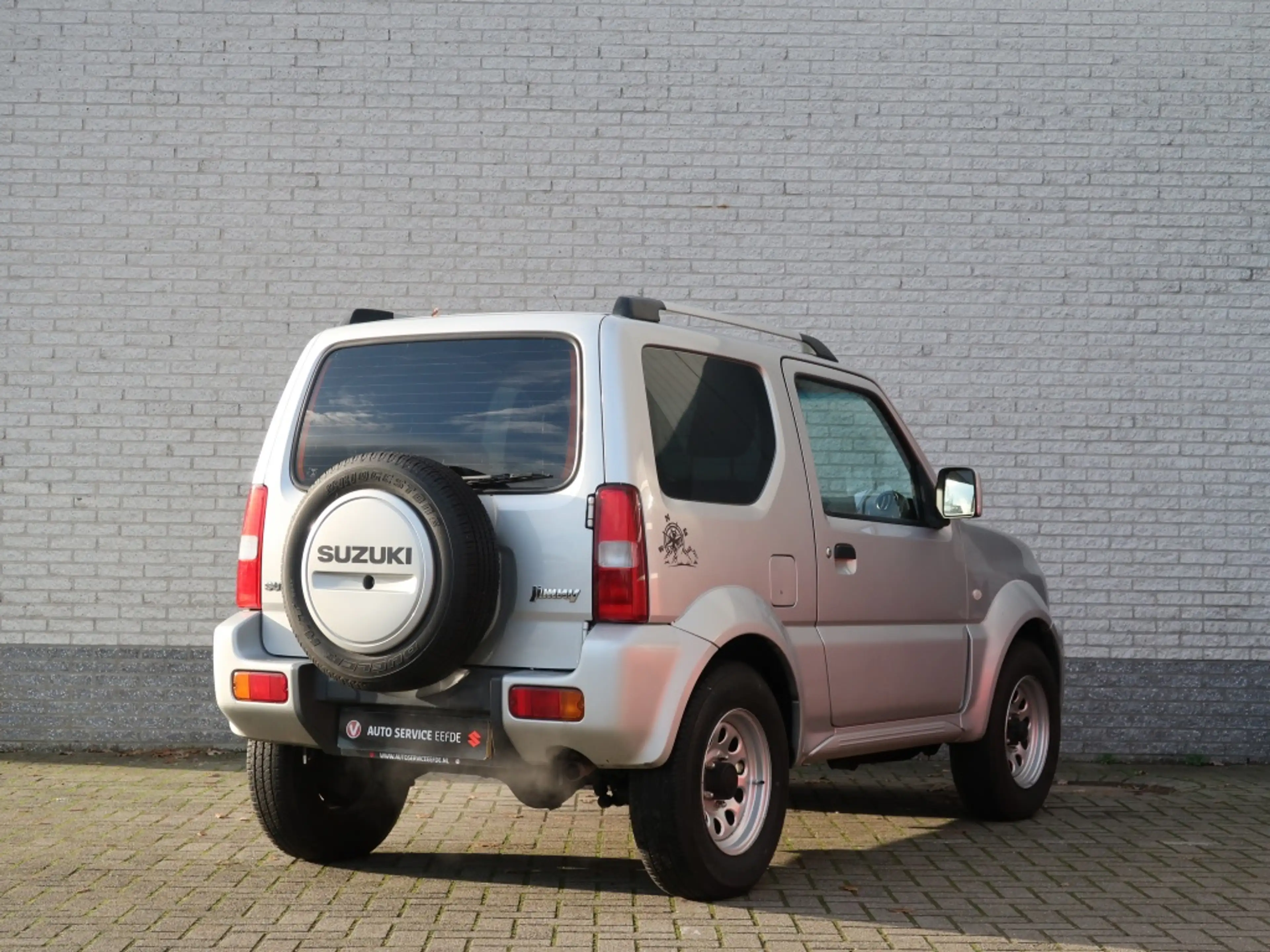 Suzuki Jimny 1.3 Exclusive / Automaat / 4x4 — photo 2