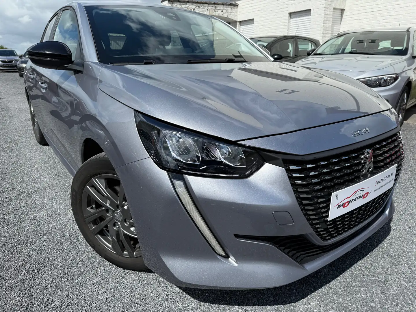 Peugeot 208 1.2iAllure Pack applecarplay 12M waarborg Argent - 1