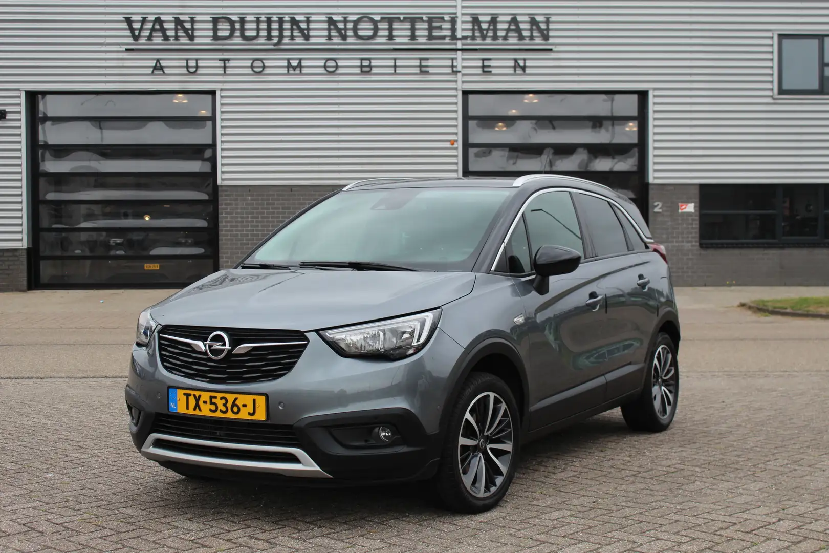 Opel Crossland X 1.2 Turbo Online Edition / Carplay / Automaat / N. Grijs - 1