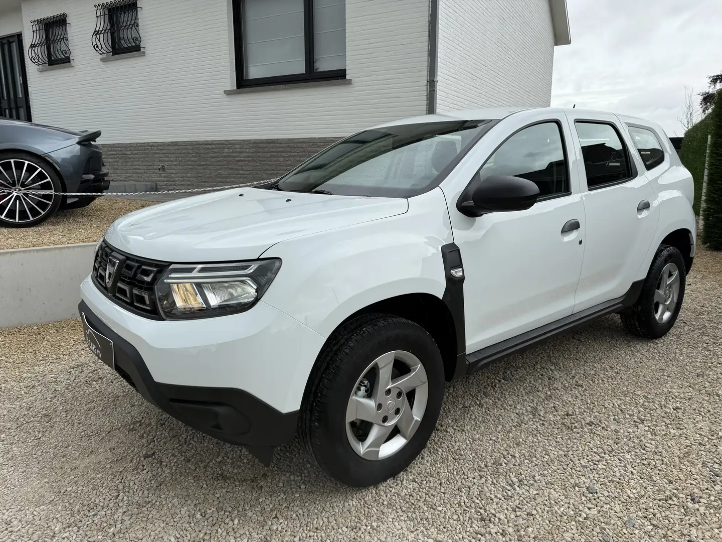 Dacia Duster BENZINE 21200 KM NIEUWSTAAT Biały - 1
