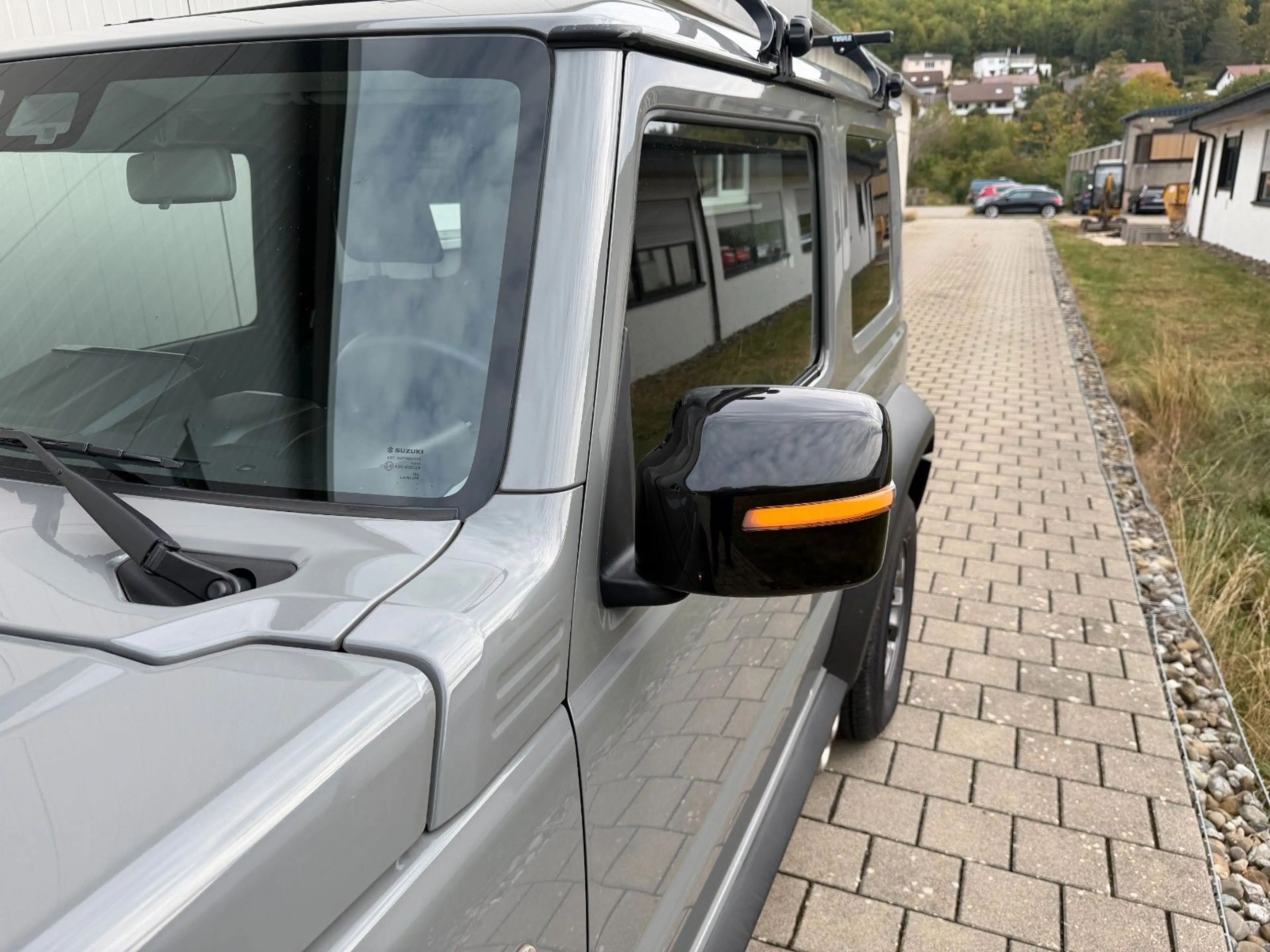 Suzuki Jimny Comfort+  4 Sitze AHK — photo 11