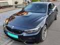 BMW M4 Coupe DKG Schwarz - thumbnail 1