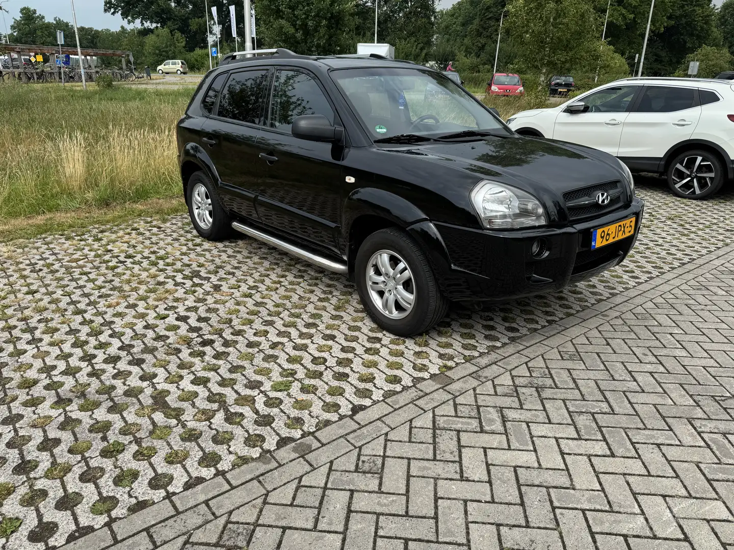 Hyundai TUCSON 2.0i Dyn. Executive Noir - 1