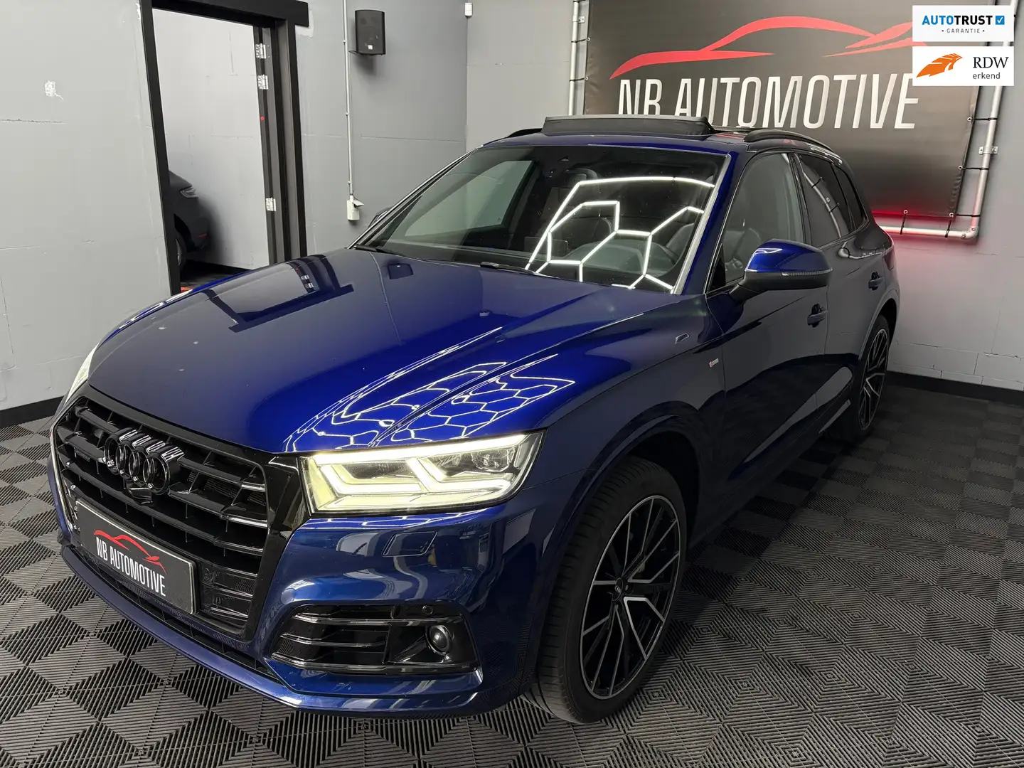 Audi Q5 55 TFSI e quattro Competition S-line Pano Blauw - 1