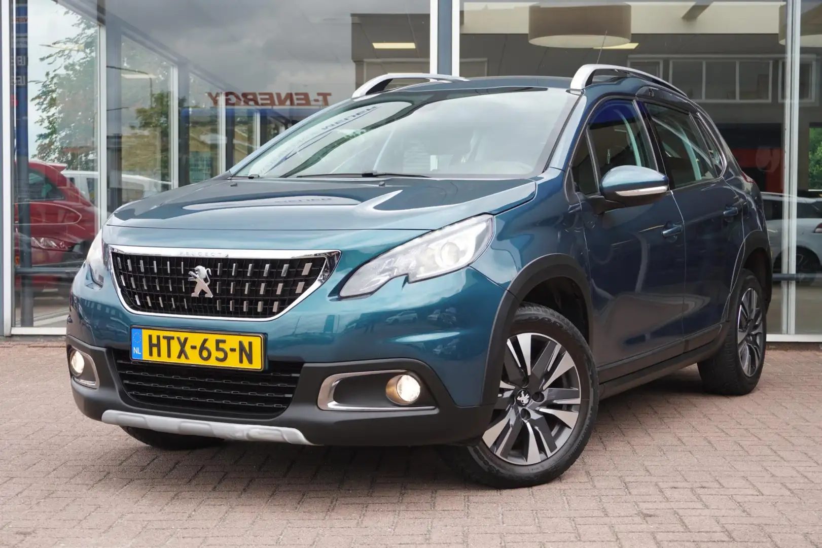 Peugeot 2008 1.2 PureTech Allure | Automaat | Navigatie | Airco Groen - 1